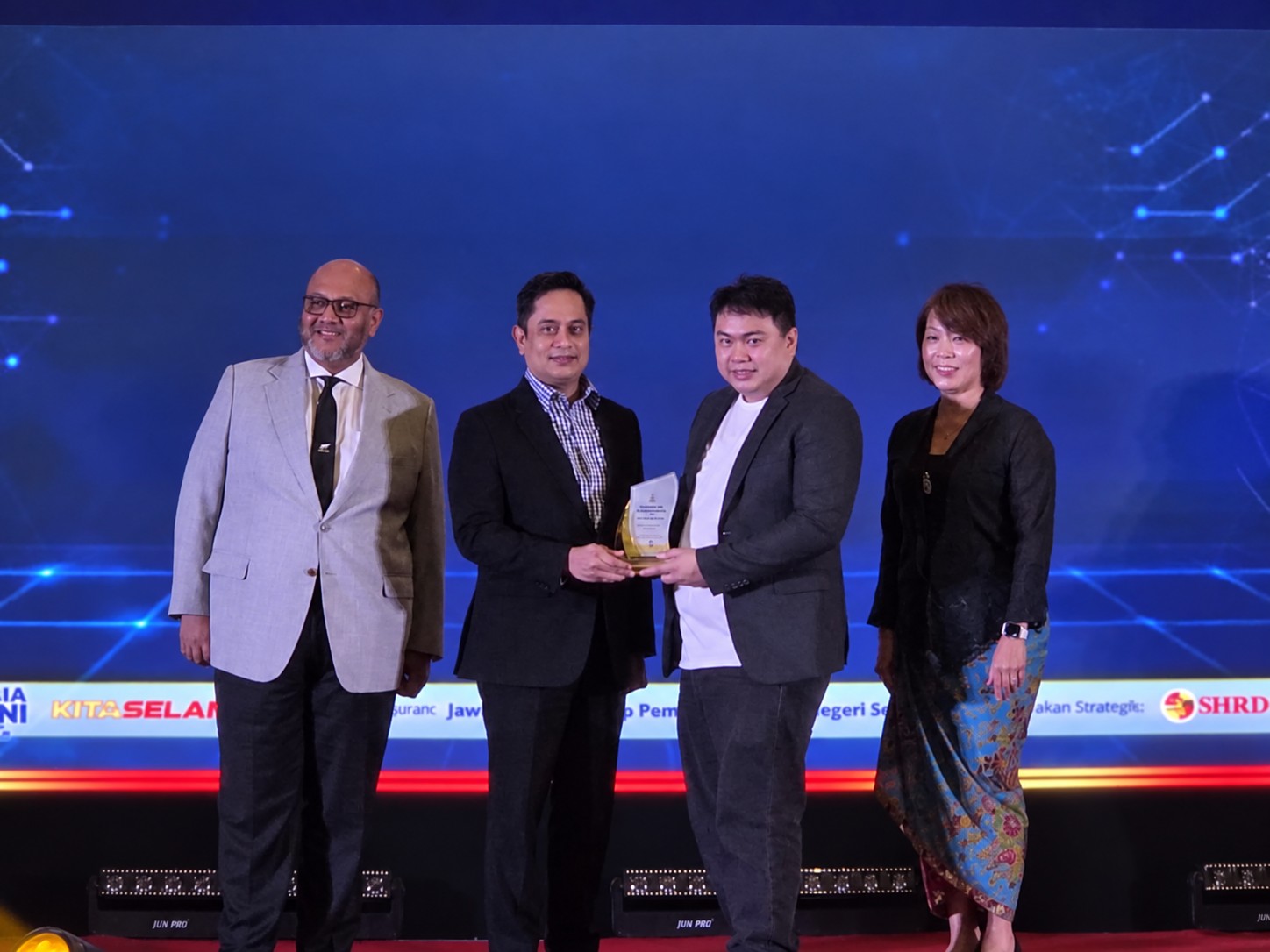 Michael Chin receiving an award at Finalist Winner — Selangor AI Hackathon 2026 by SHRDC